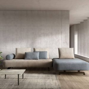 Elegante divano modulare in tessuto beige e grigio, ideale per soggiorni moderni e minimalisti, complementi d'arredo di alta qualità per interni eleganti.