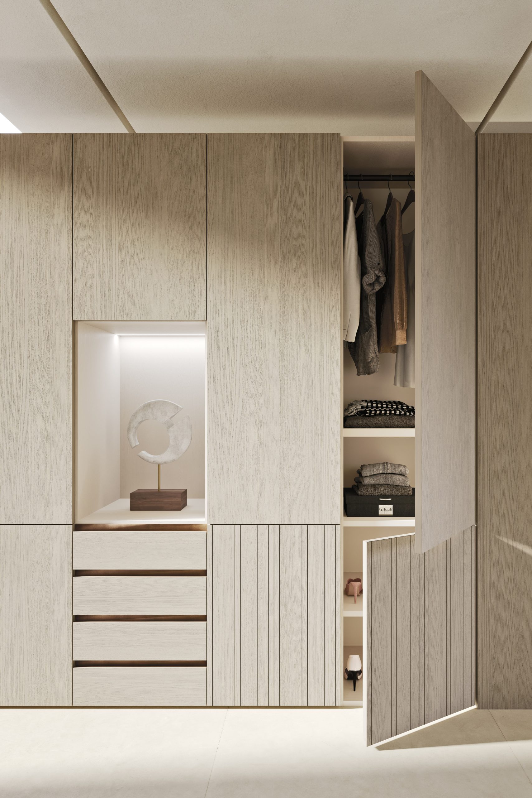 2025_mobilgam_n03_p3 Elegante armadio su misura in legno chiaro con ante a battente e cassetti, design moderno e funzionale per arredare con stile spazi di casa.