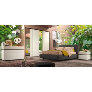Camera da letto moderna con pareti decorate con grandi foglie verdi e mobili eleganti di Alpe Arredi.