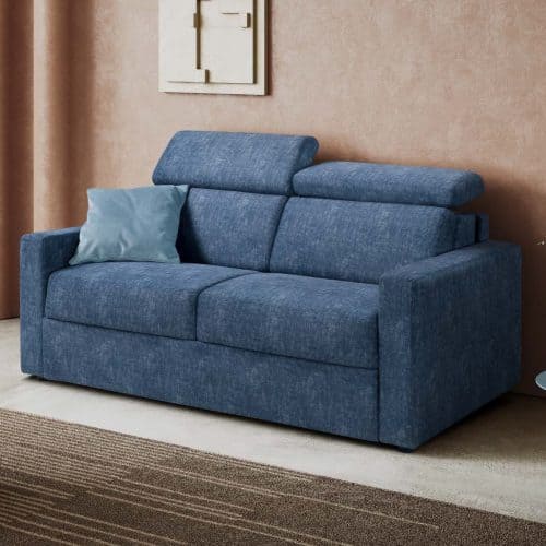 Divano GIOVE con schienale regolabile in tessuto blu in ambiente domestico.