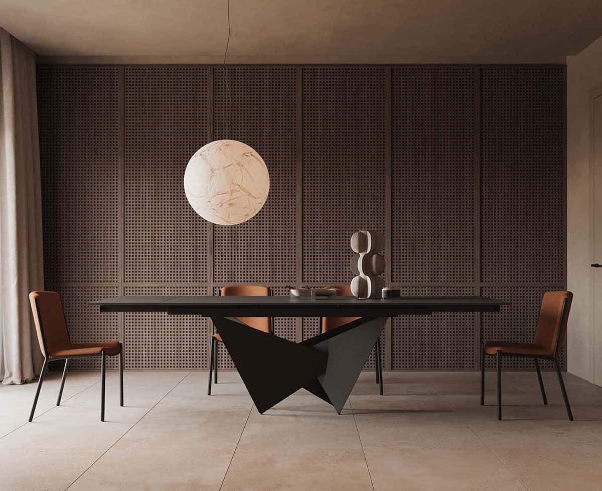 Tavolo allungabile ALISEO 160 in un ambiente moderno con sedie in pelle e decorazioni minimaliste.